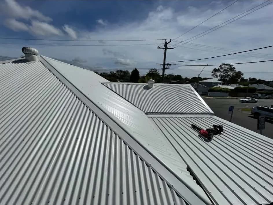 Ridge capping on a new Colorbond corrugated roof